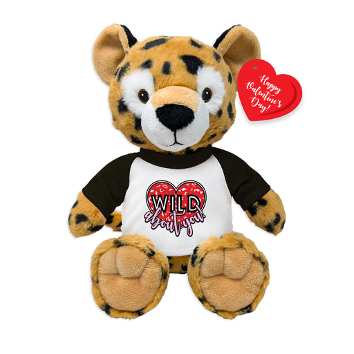 Plush toy leopardskin animal with a 'Wild' shirt and Valentine's Day heart tag on a white background
