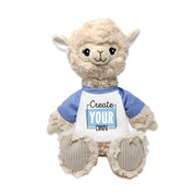 A cream-colored alpaca plushie with a blue and white shirt that says 'Create Your Own'.