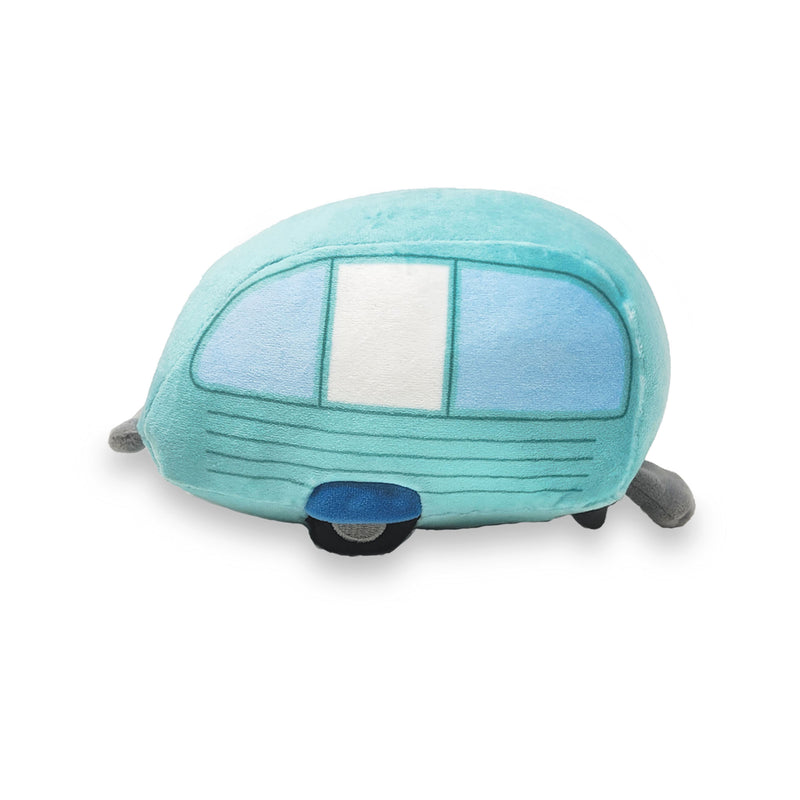 A soft plush toy resembling a blue and green camper with a 'Happy Camper' text and a cute face on the front.