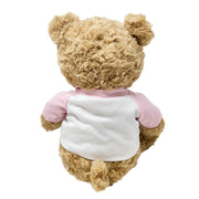 Back view of teddy bear plush wearing “Birthday Girl” shirt