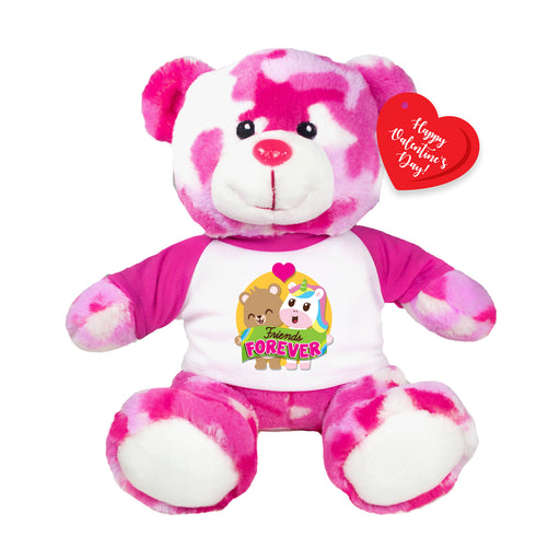 Pink and white teddy bear with a heart-shaped tag on a white background