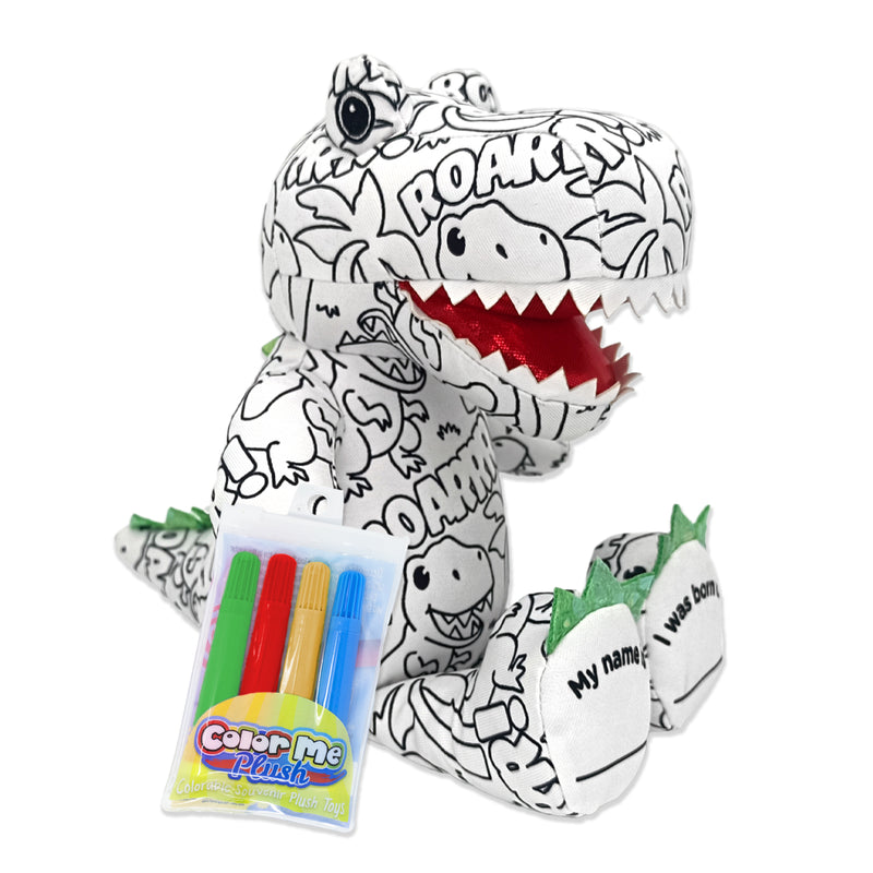 A plush toy resembling a T-rex dinosaur with a coloring design, accompanied by washable markers.