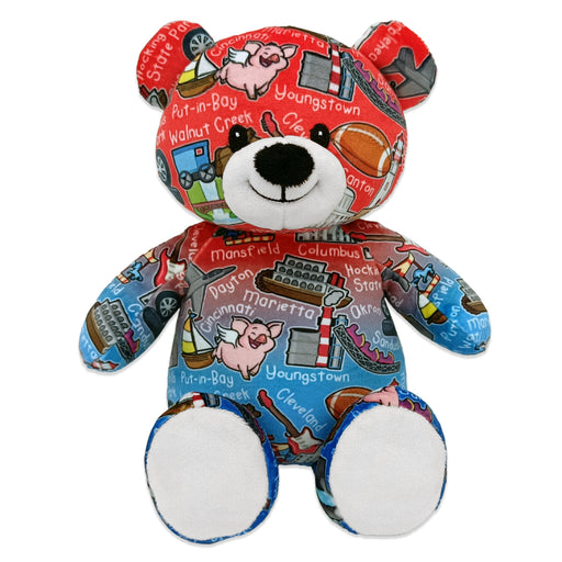 A plush teddy bear with a colorful design featuring city names and icons related to Ohio.
