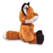 Side view of a plush toy fox with a brown body, black legs, white and grey ears, and a white face.
