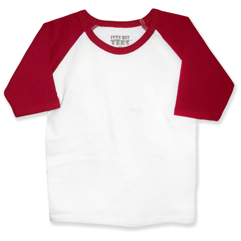 Front view of a blank white toddler raglan t-shirt with red three-quarter length sleeves on a transparent background.