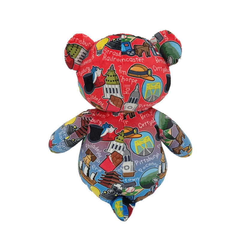 Back View of Colorful teddy bear with a pattern of images and text on a white background