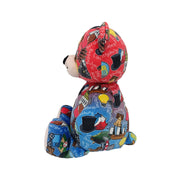 Side view of Colorful teddy bear with a patterned design on a white background