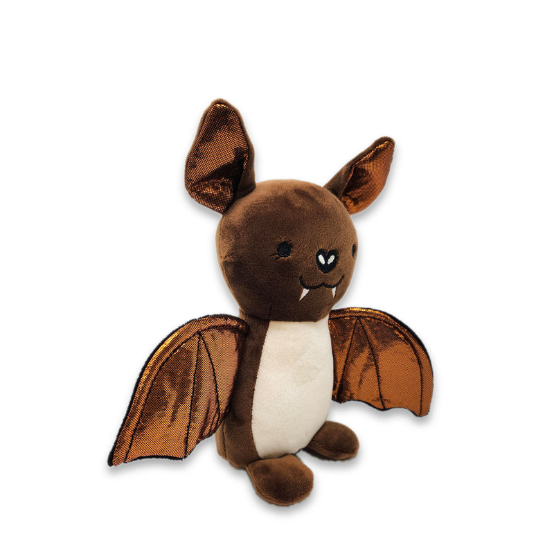 Brown bat plush with metallic copper wings, tan belly, pointed ears, and small white fangs, shown standing at a slight angle.