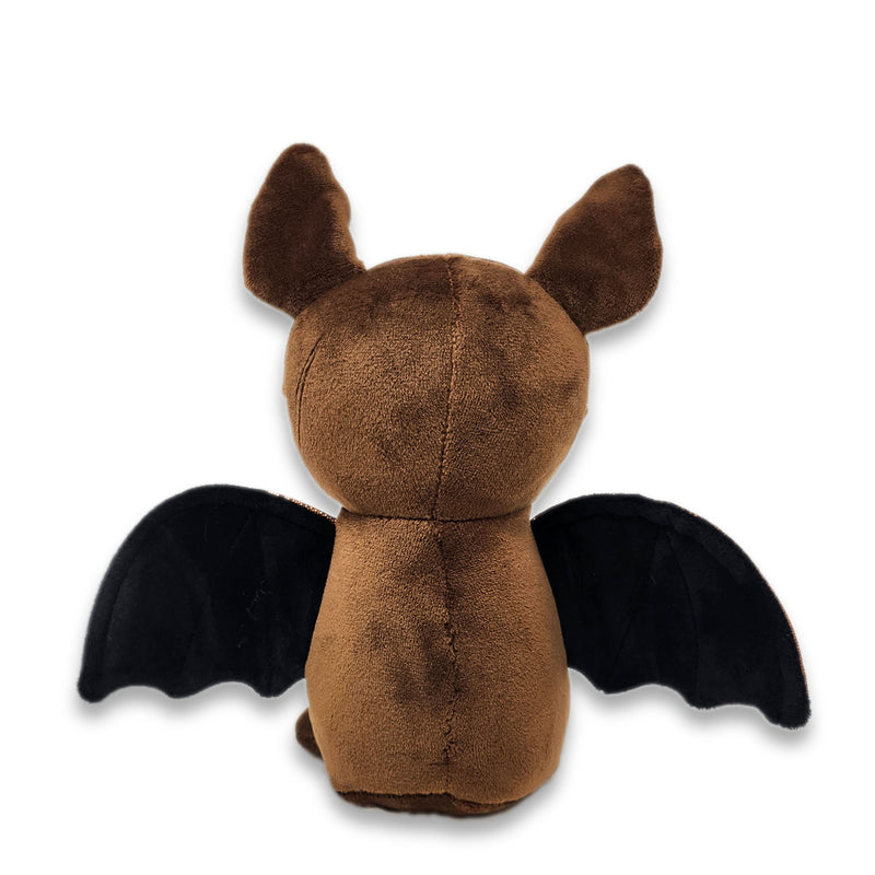 Back view of a brown bat plush with pointed ears and solid black wings extended outward against a white background.