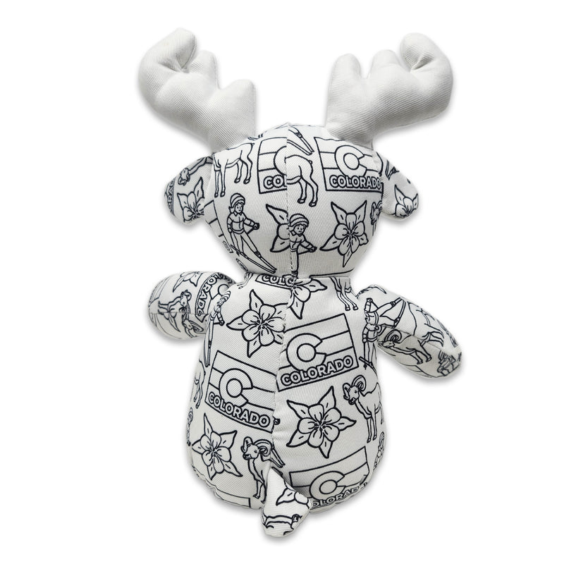 Back view of a black-and-white colorable plush moose with Colorado-themed illustrations and white fabric antlers.