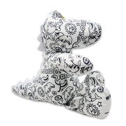 Side view of a black-and-white colorable plush frog printed with Florida-themed outlines, showing yellow eyes and a foot panel that reads “My name is.”