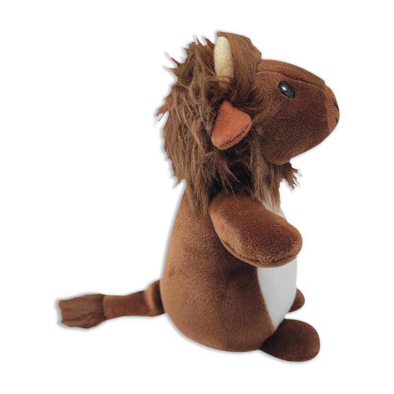 Side view of a brown plush lion with a shaggy mane, small tan horn-like ears, white belly, rounded arms and legs, and a long tail on a transparent background.