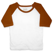 Front view of a blank white toddler raglan t-shirt with brown three-quarter length sleeves.