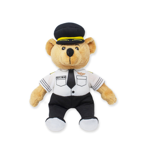 A beige teddy bear dressed in pilot attire including a cap, tie, shirt, and pants, complete with a 'Ted E. Bear' nameplate.