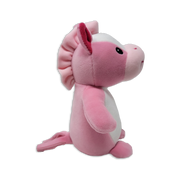 Side view of a pink plush seahorse with a lighter pink belly, ruffled fin along the head and back, small stitched eye, short arms, and curled tail on a transparent background.