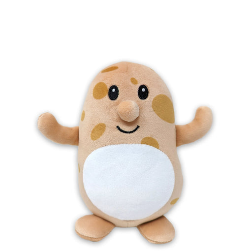 A plush toy resembling a potato with a smiling face, white belly, and brown spots.