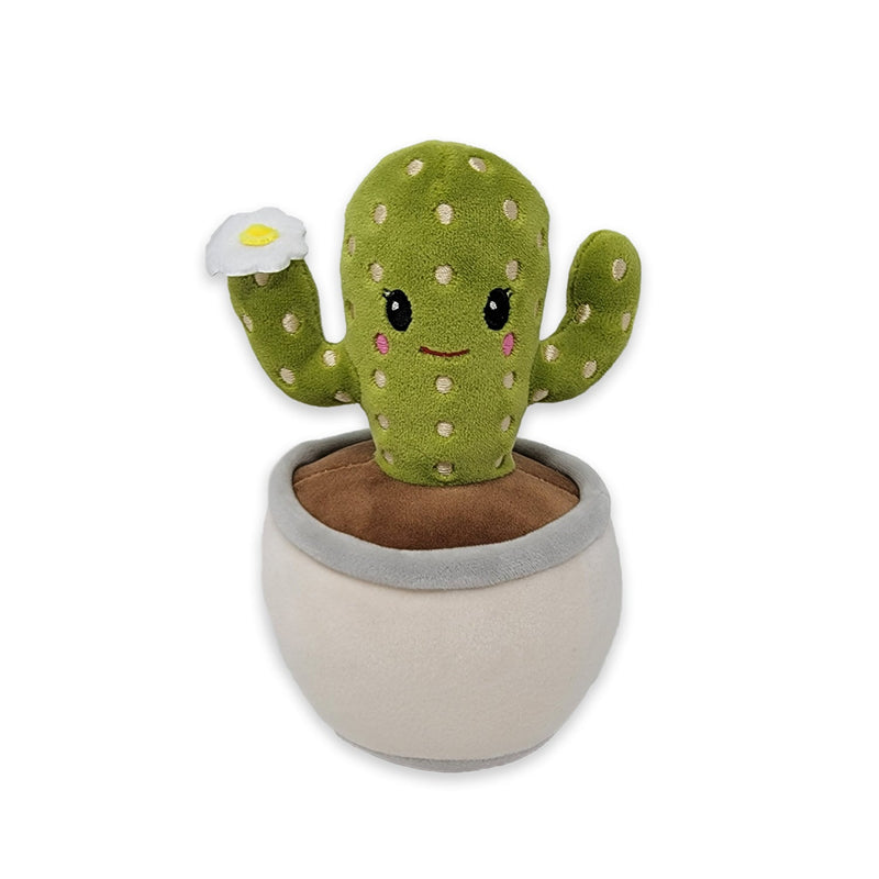A plush saguaro cactus with a smiling face, green body with white dots, and a brown base, sitting in a beige pot.